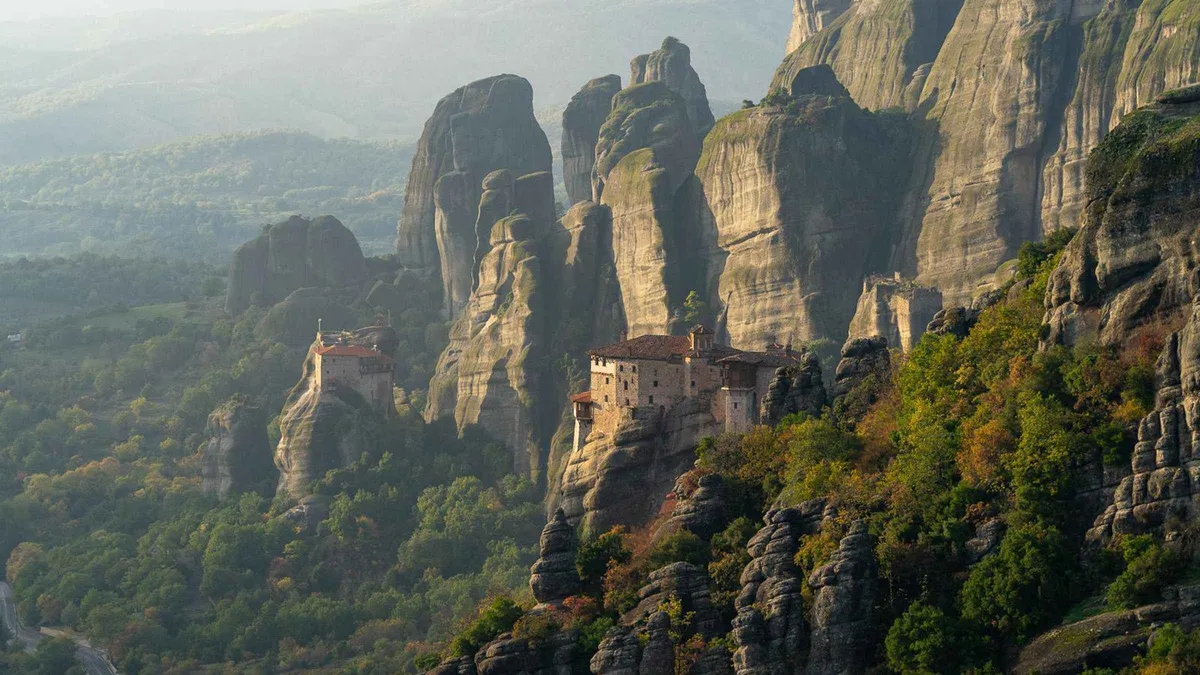 A train crossing the Thessalian plain towards Meteora on a day trip from Athens, Greece