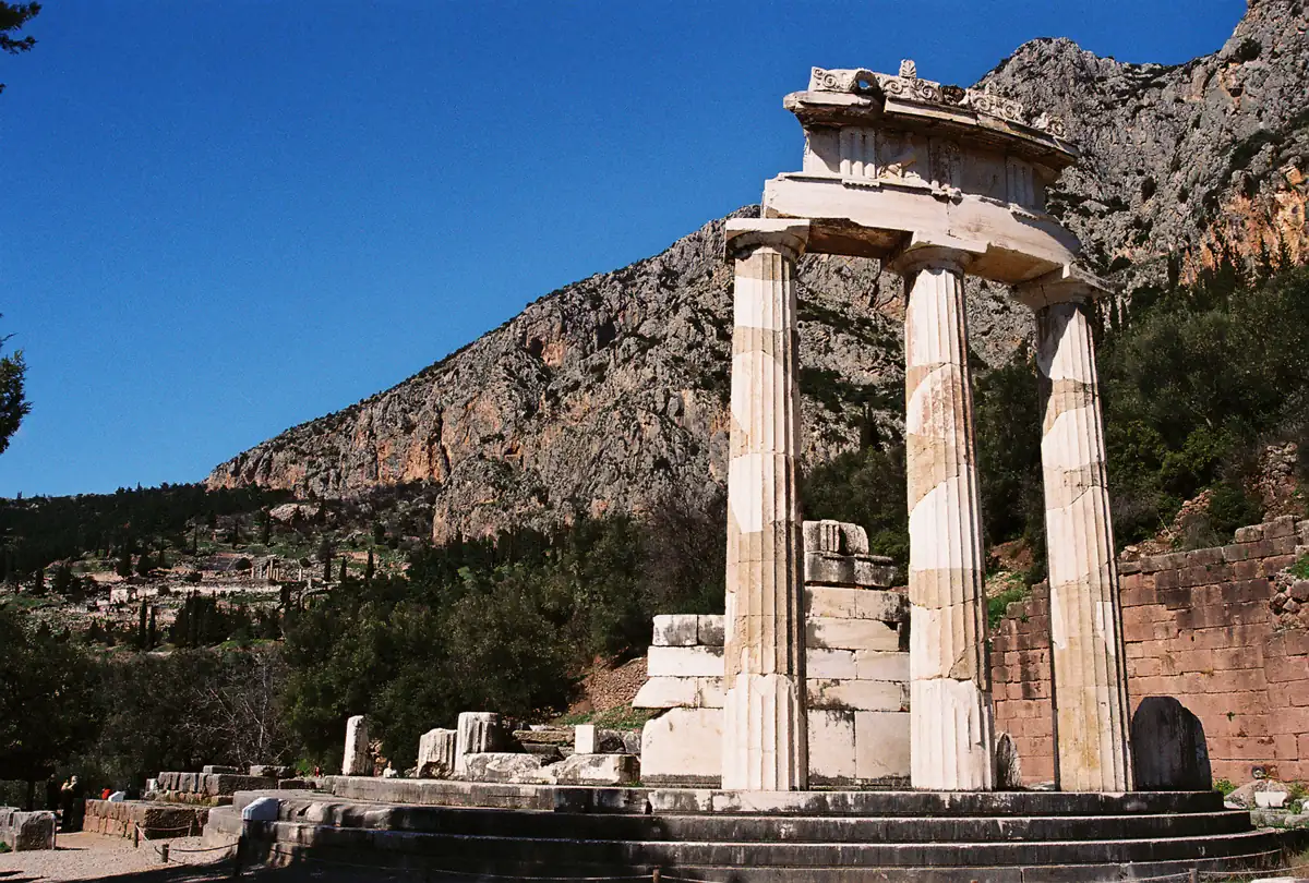 The Tholos at the Sanctuary of Athena Pronaia below the archaeological site of Delphi, a day trip from Athens, Greece