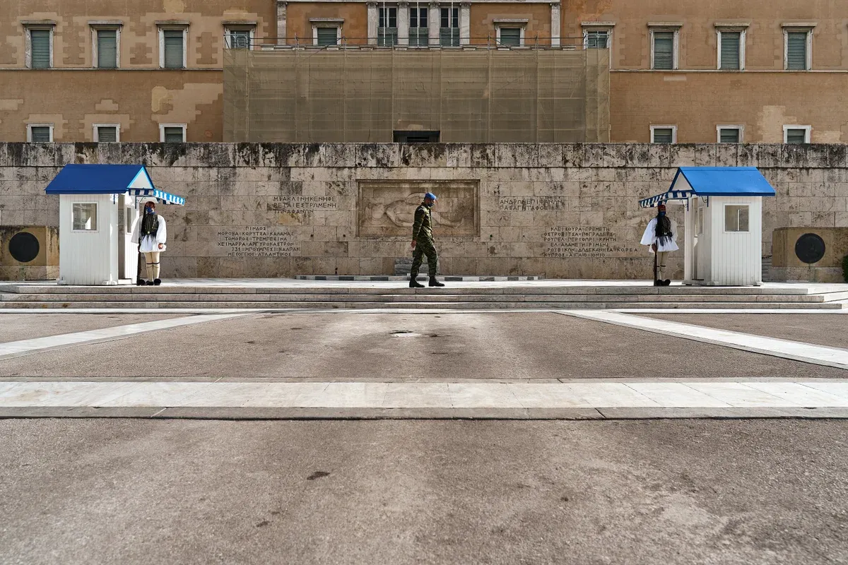 An Evzone of the Presidential Guard in the 400-pleat fustanella at the changing of the guard in Athens, Greece