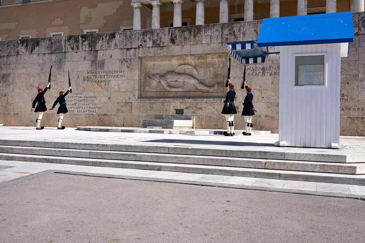The Tomb of the Unknown Soldier below the Greek Parliament with Evzones on either side of the sentry box, Athens, Greece
